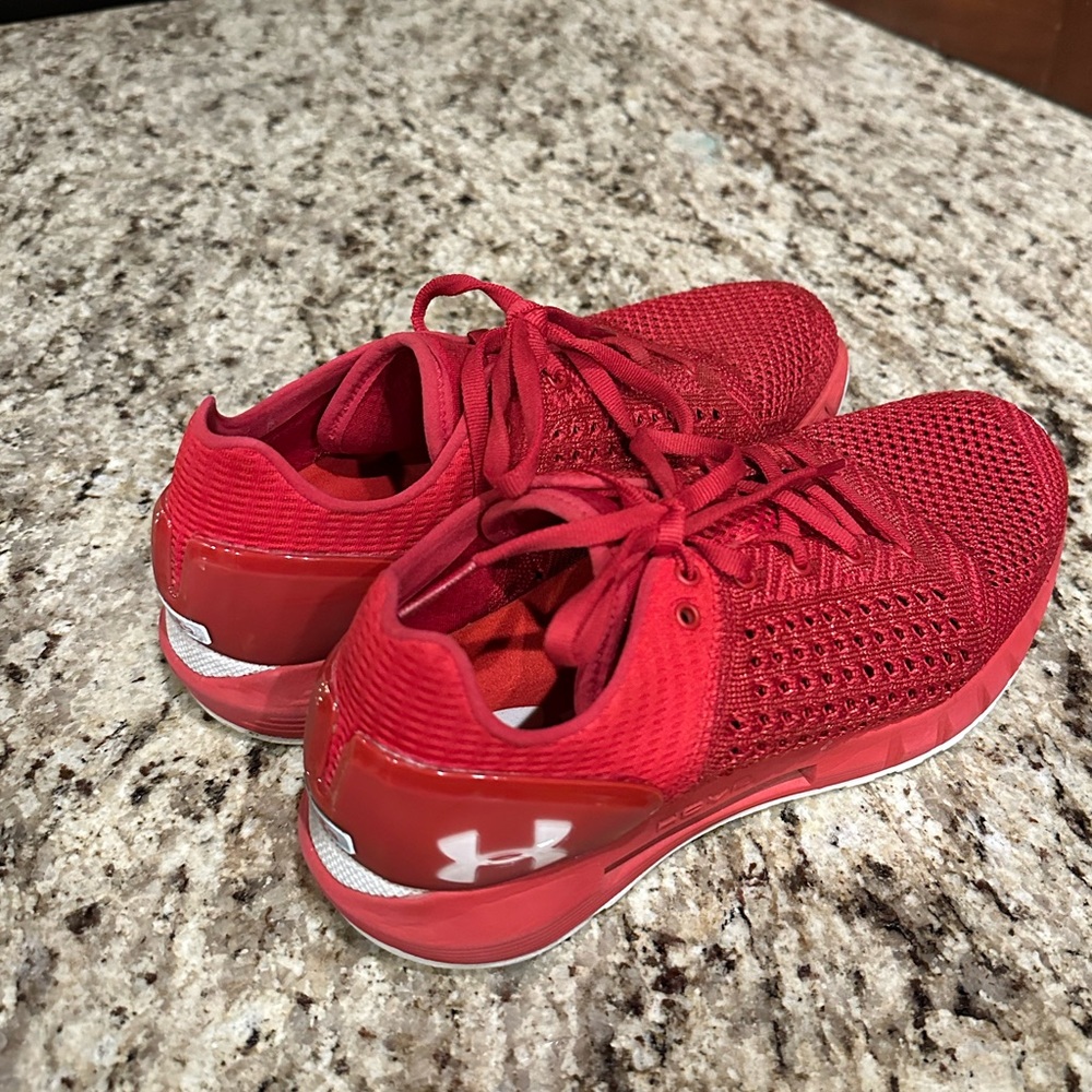 Red under armor running shoes